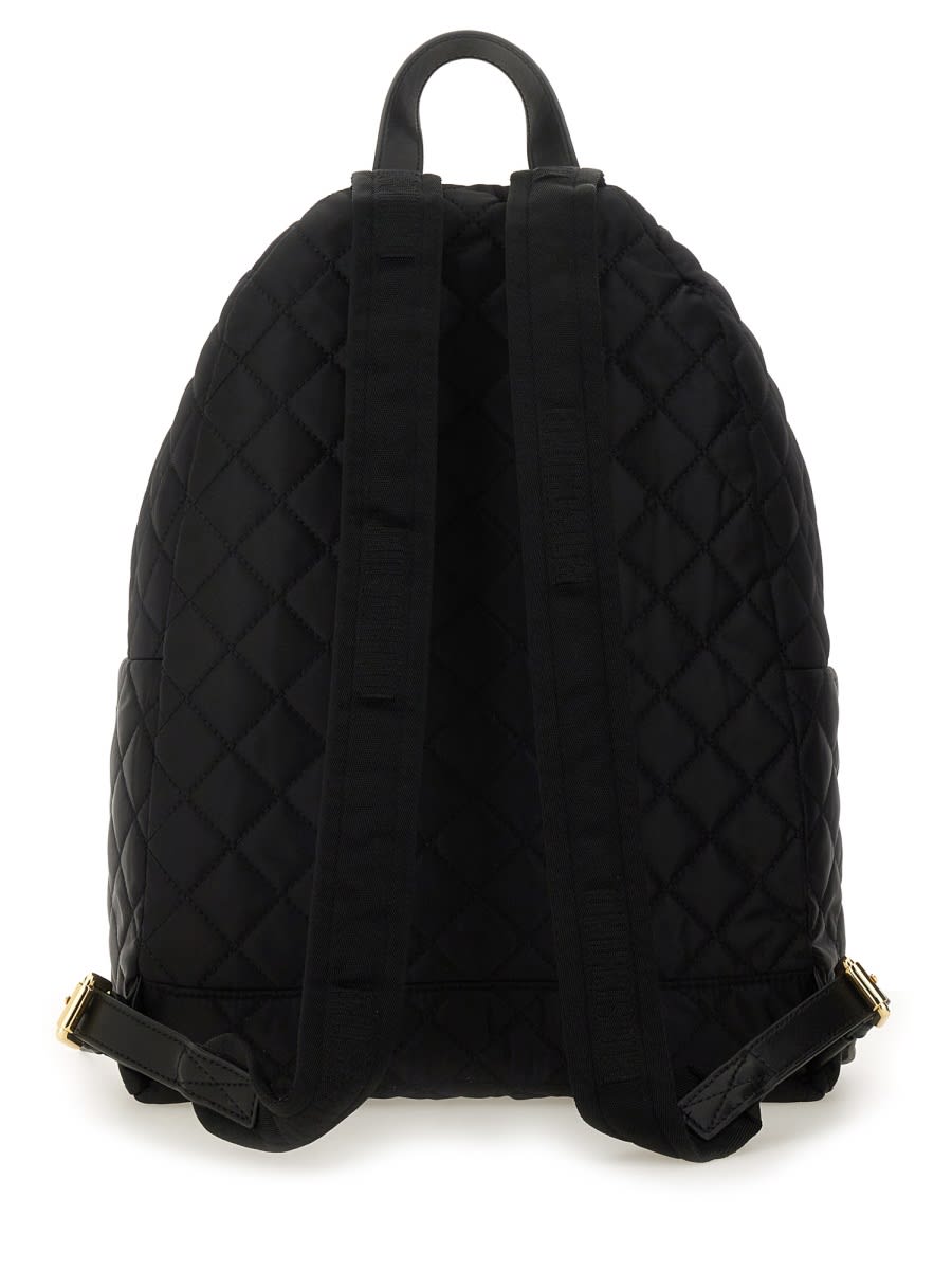 Moschino Quilted Logo Backpack In Black
