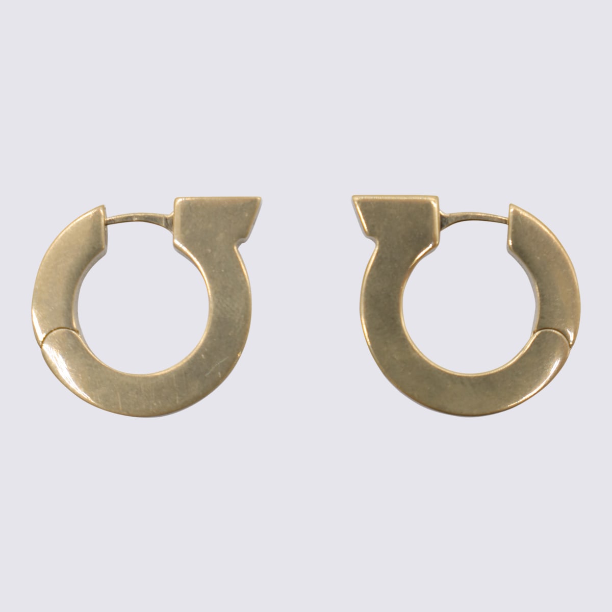 Ferragamo Gold Brass Hoop Gancini Earrings In Golden