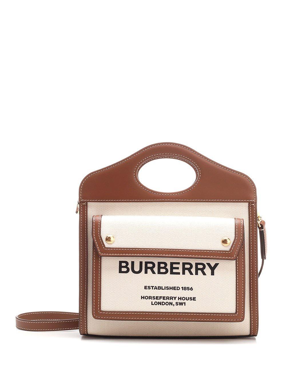 Shop Burberry Pocket Mini Handbag In Natural/malt Brown