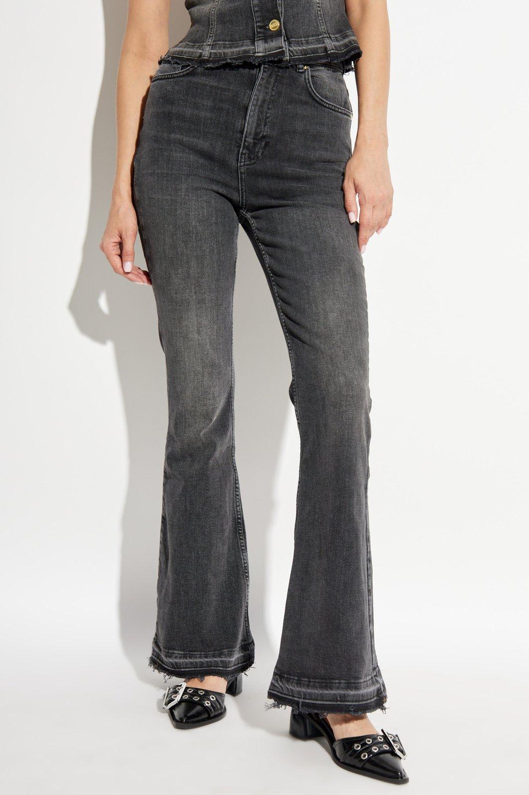 Shop Ganni Flared Jeans In Denim