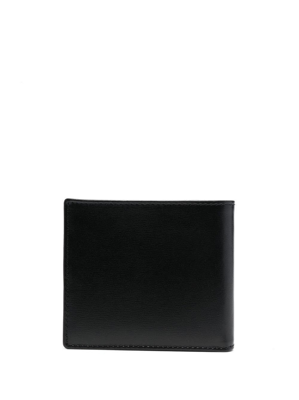 Shop Tod's Wallet In Black