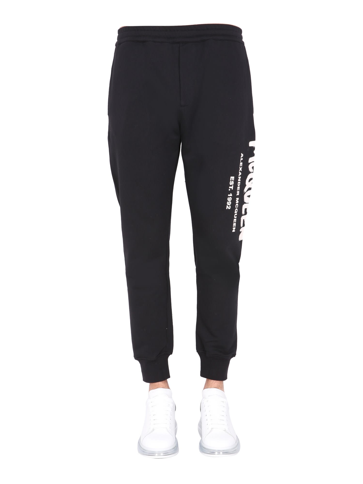 Alexander Mcqueen Jogging Pants With Graffiti Logo In Black/ivory