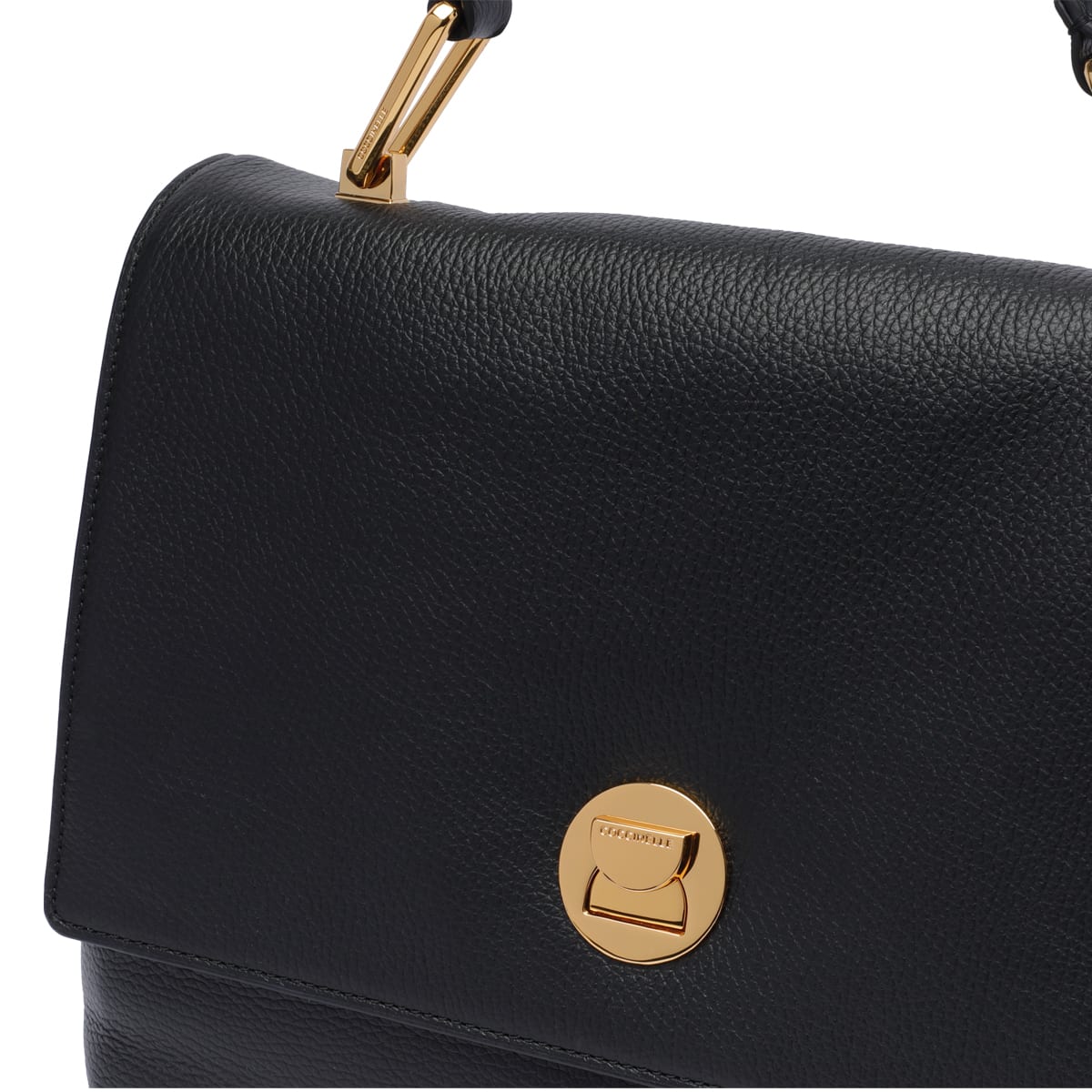 Shop Coccinelle Liya Handbag In Black