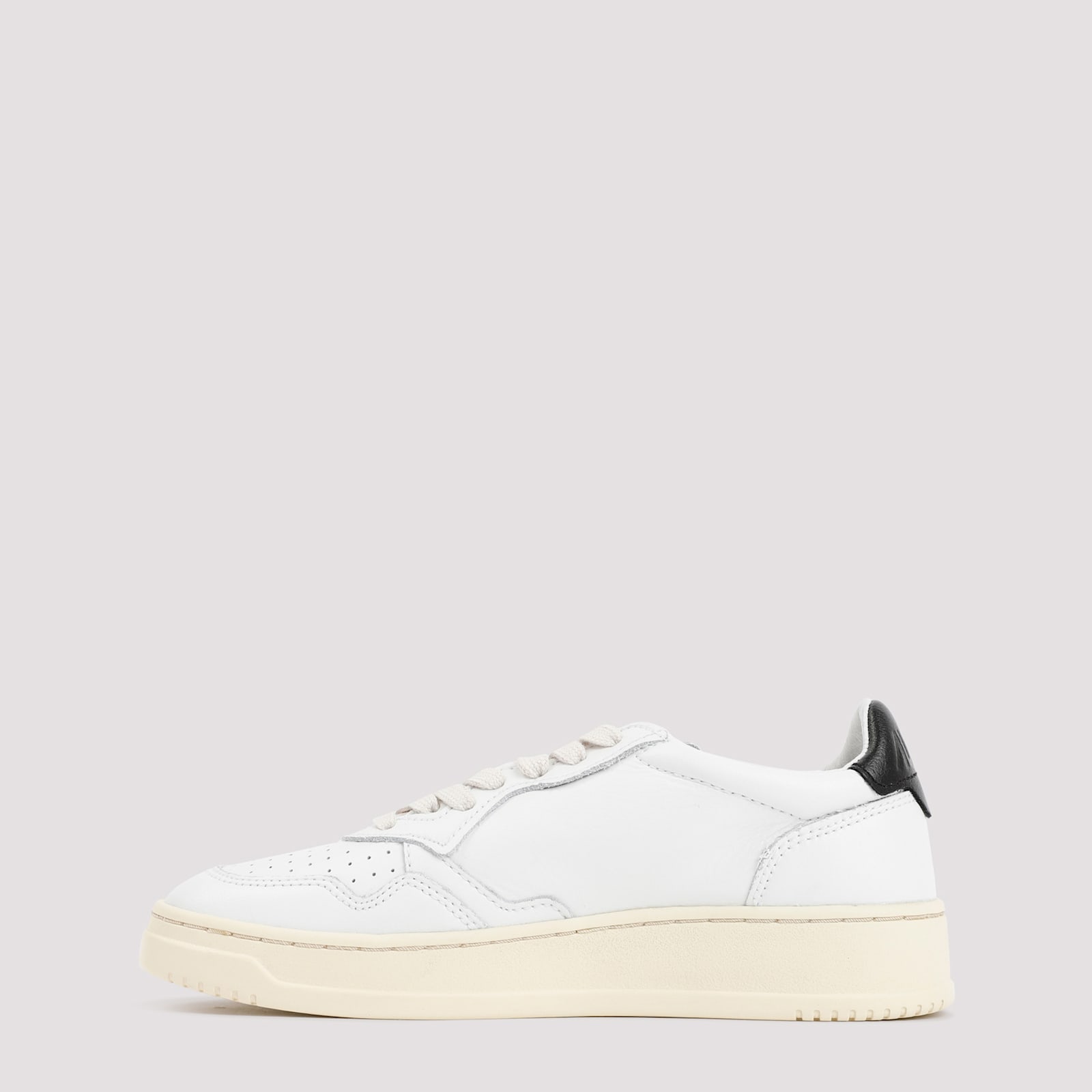 Shop Autry Medalist Leather Low Sneakers In Wht Black