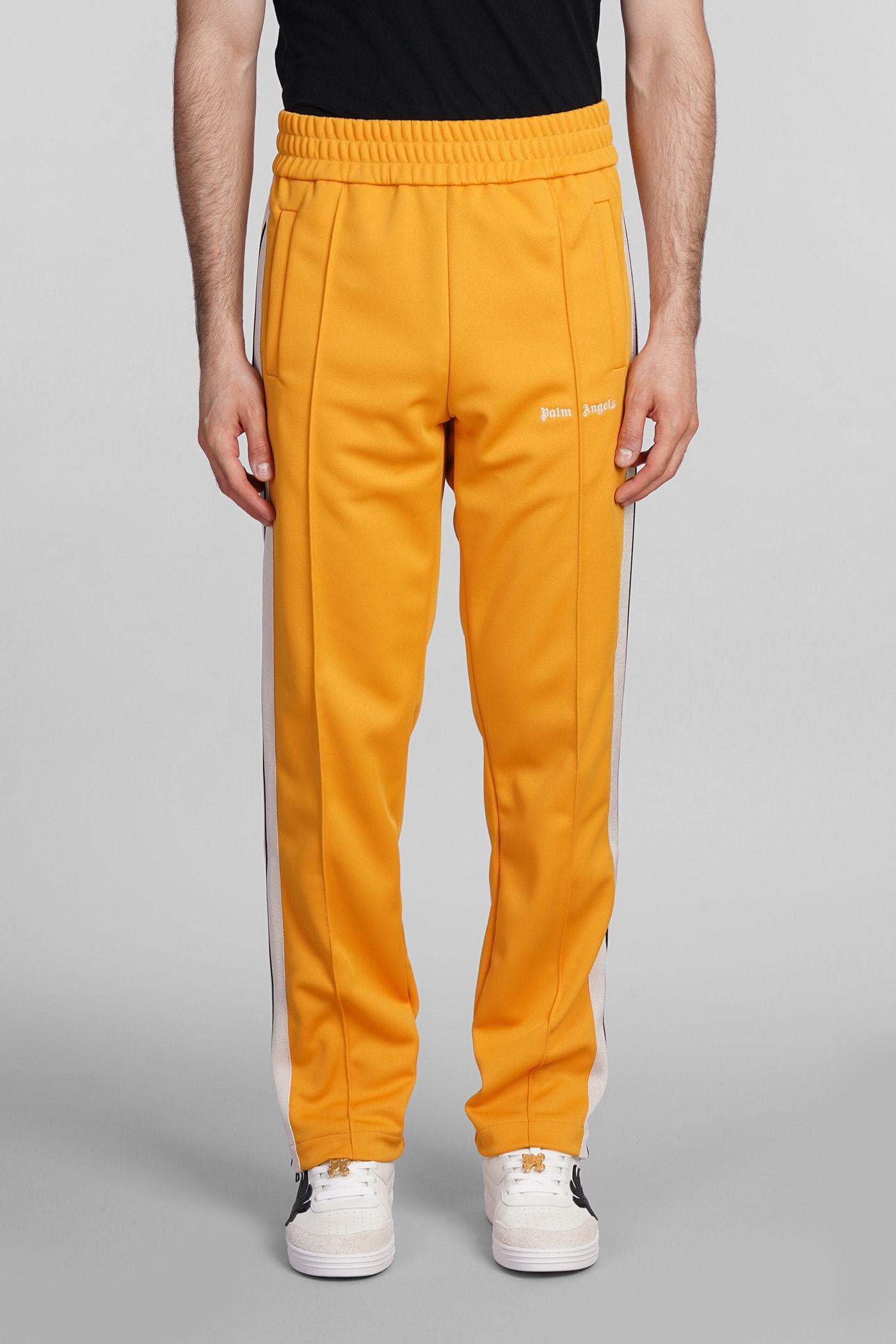 Shop Palm Angels Pants In Orange Polyester