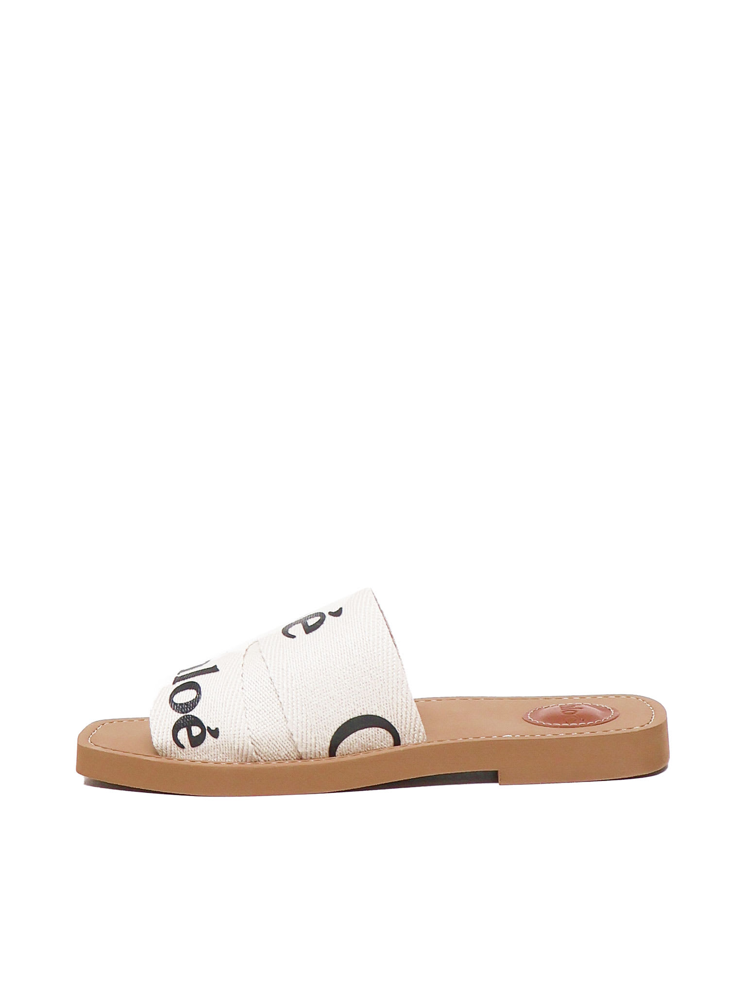 Shop Chloé Woody Slides In White