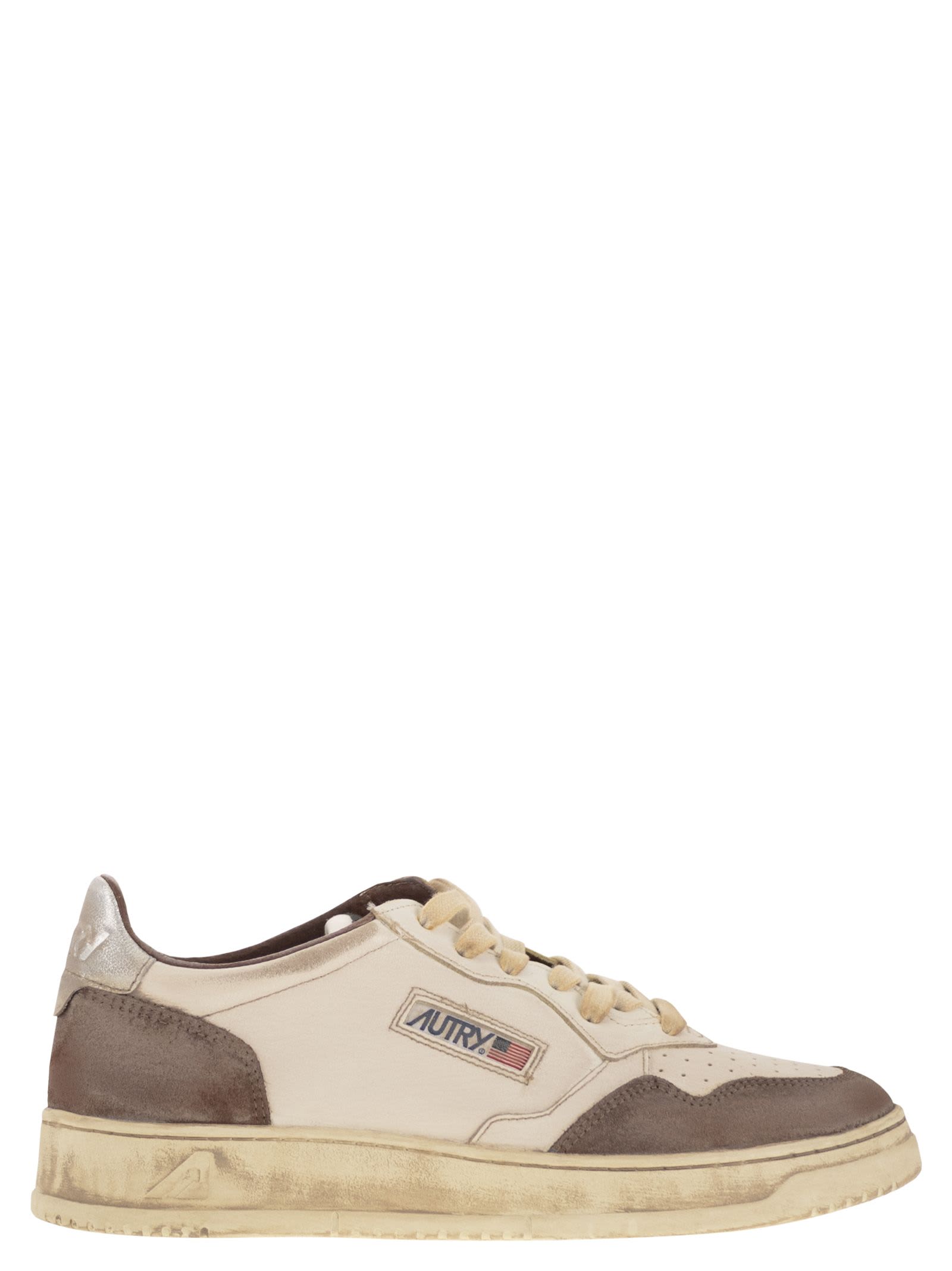 Autry Low Top Sneakers With Contrasting Leather Inserts In White