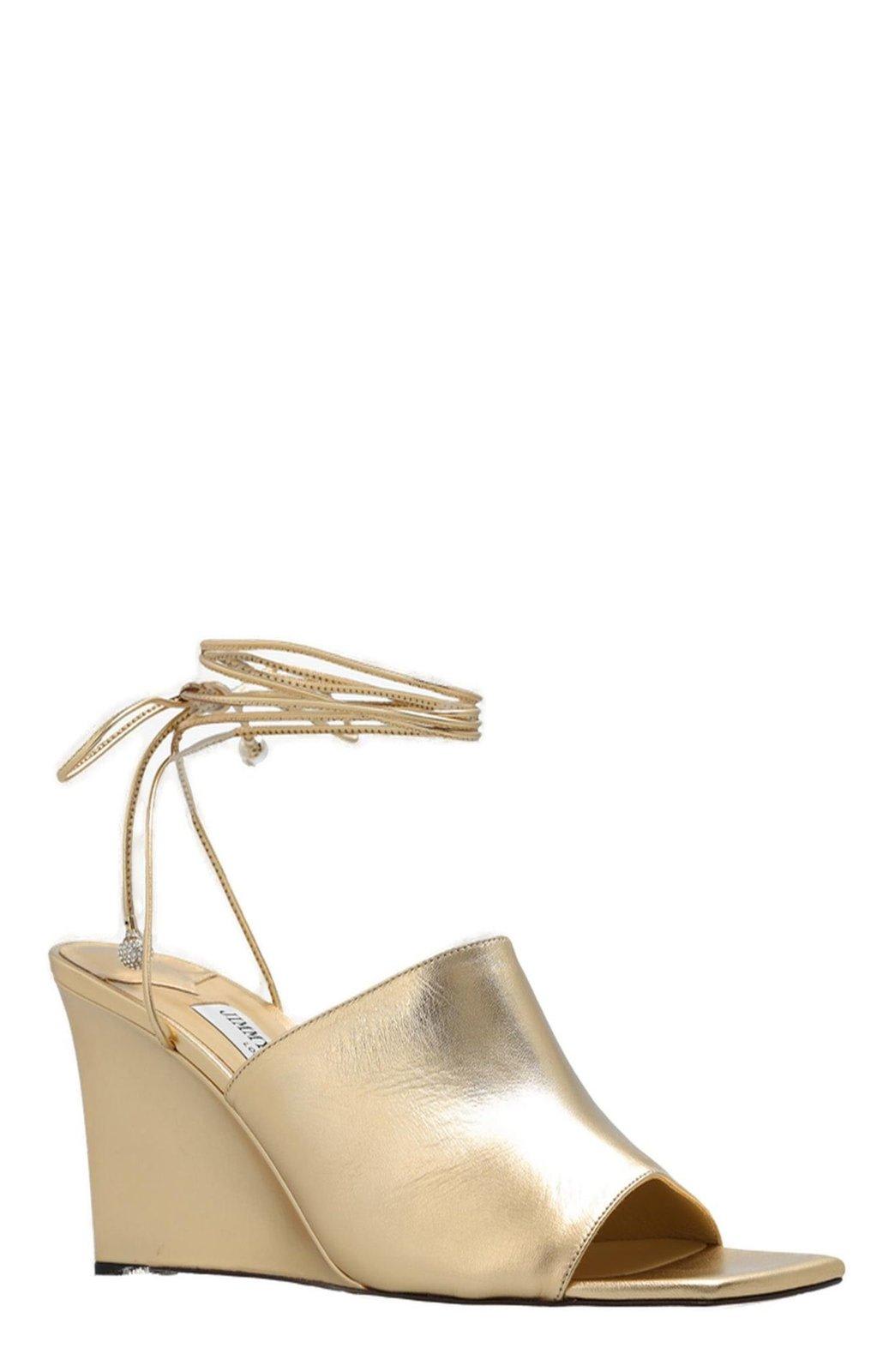 Shop Jimmy Choo Elyna Wedge Sandals In Gold