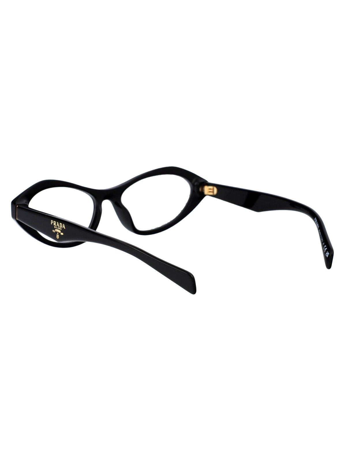 Shop Prada Cat-eye Frame Glasses In 16k1o1