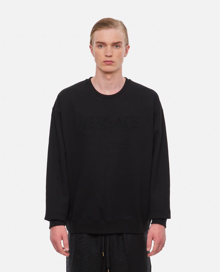 Shop Versace Crewneck Embossed Logo Sweatshirt In Black