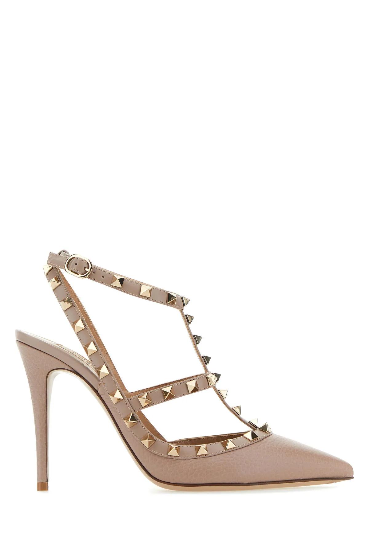 Shop Valentino Antiqued Pink Leather Rockstud Pumps In Poudre