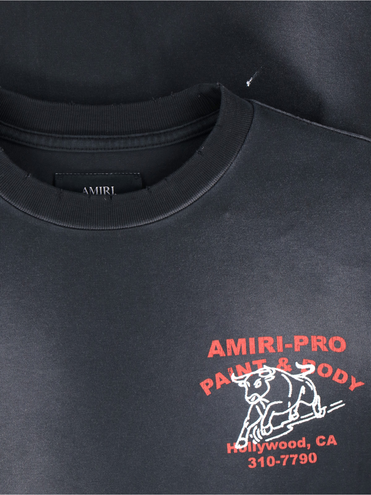 Amiri Short-sleeve T-shirt With Vintage Graphic And Distressed Finish In Blue