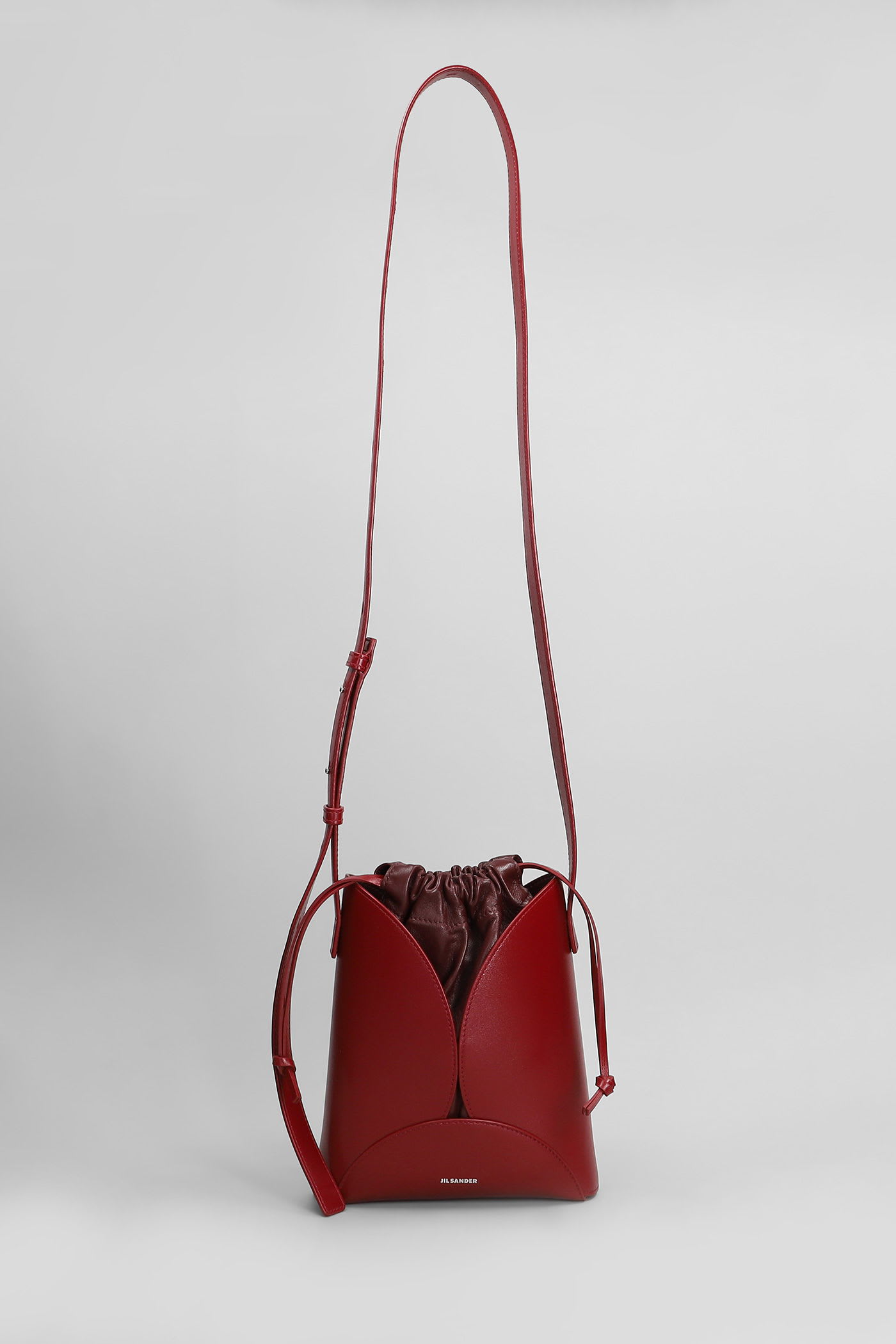Jil Sander Curve Shoulder Bag In Bordeaux Leather