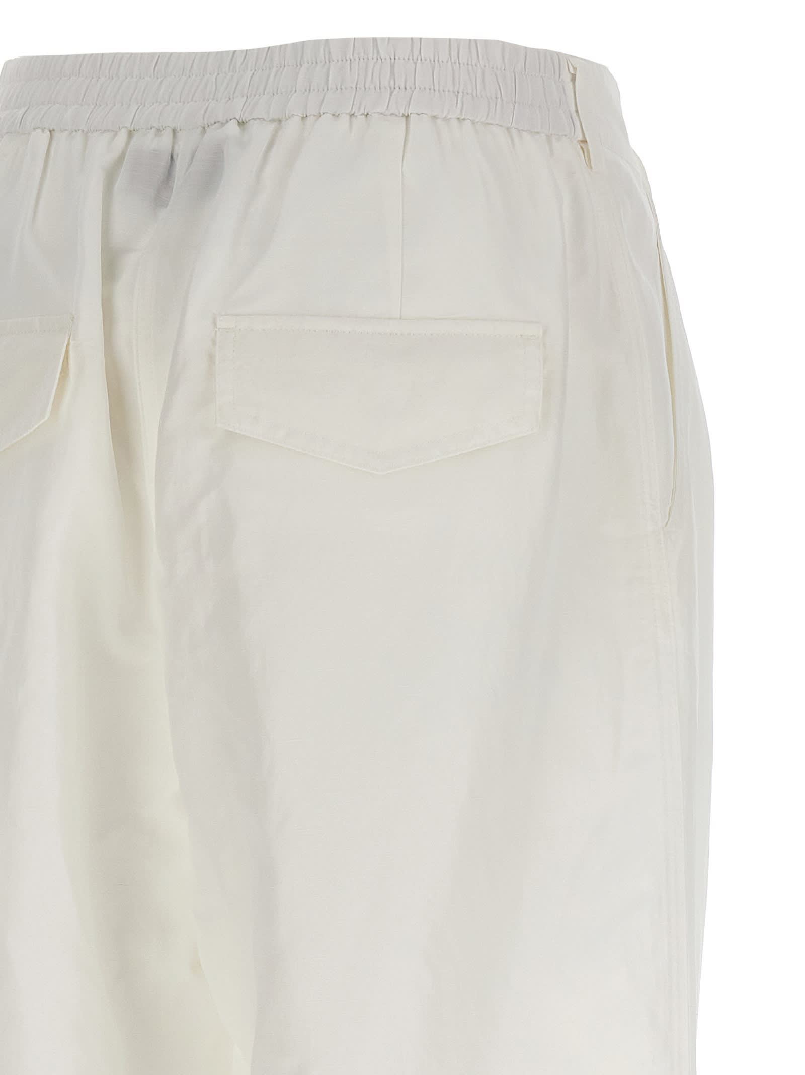 Shop Msgm Carrot Pants In White
