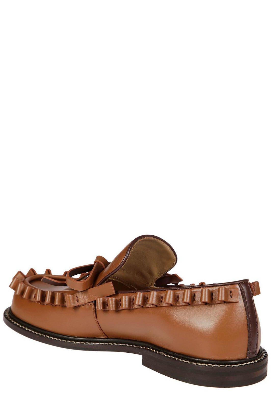 Jw Anderson Fringe Detail Bow Accent Loafers In Brown