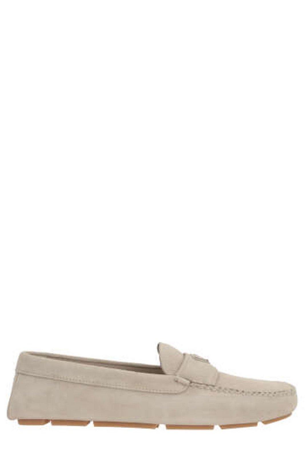 Shop Prada Logo Plaque Slip-on Loafers In Pomice