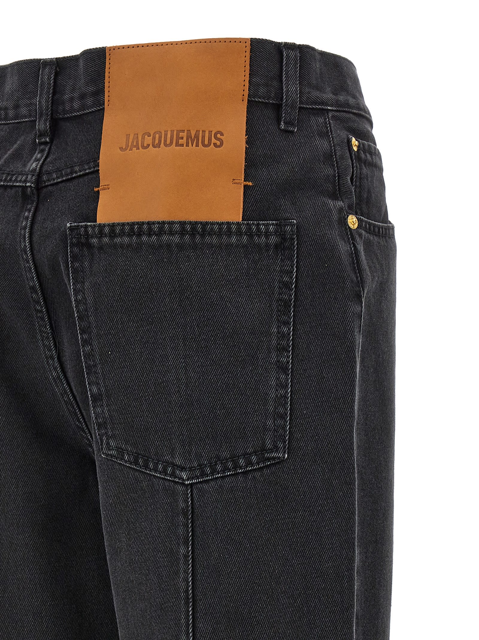 Shop Jacquemus Le De-nîmes Court Jeans In Black