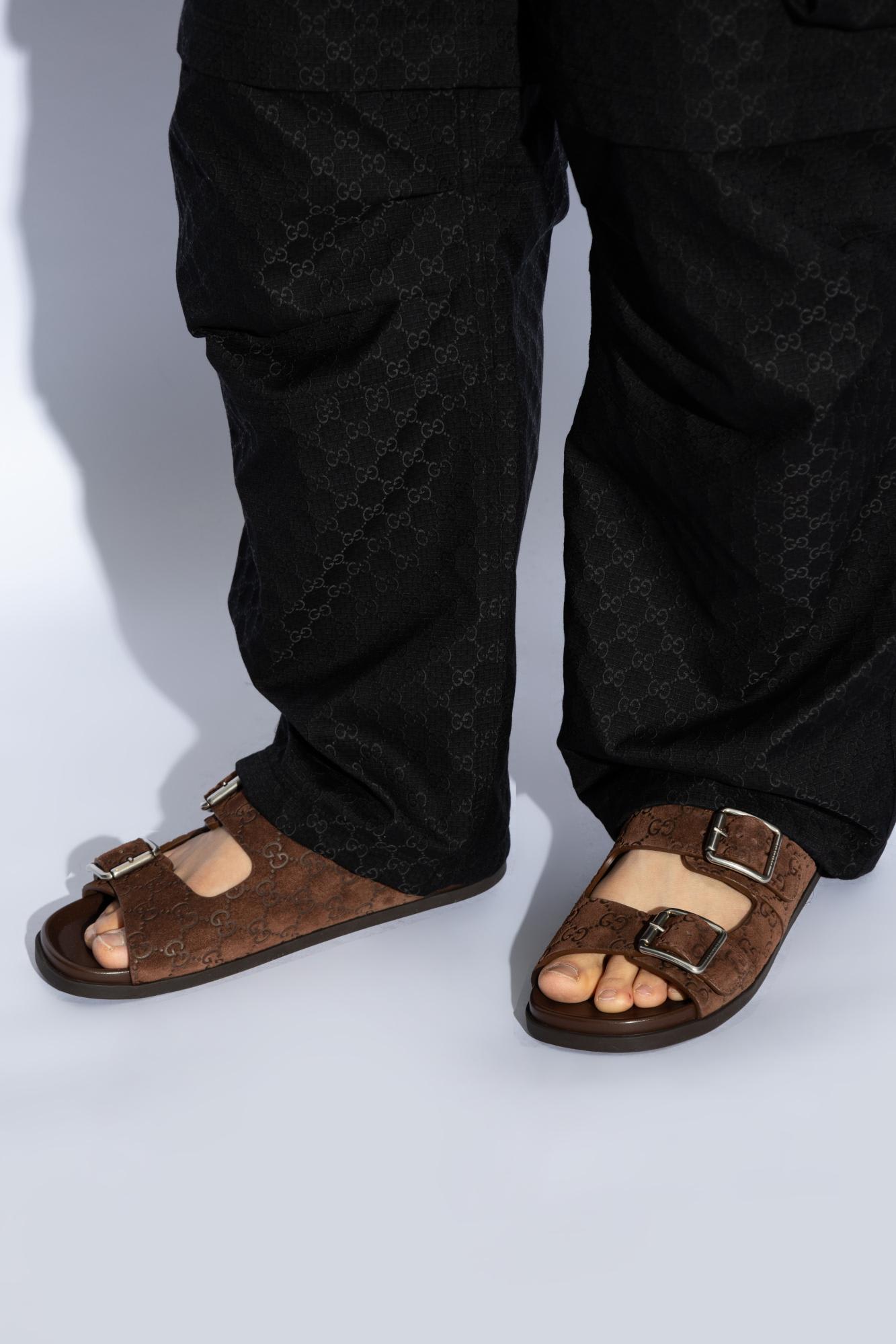 Gucci Men Logo Embossed Leather Slides In Brown
