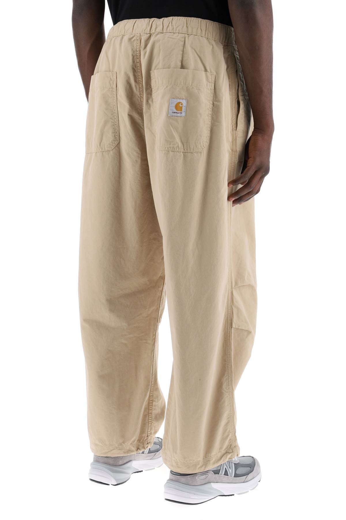 Shop Carhartt Wide-leg Judd Pants In Wall (beige)