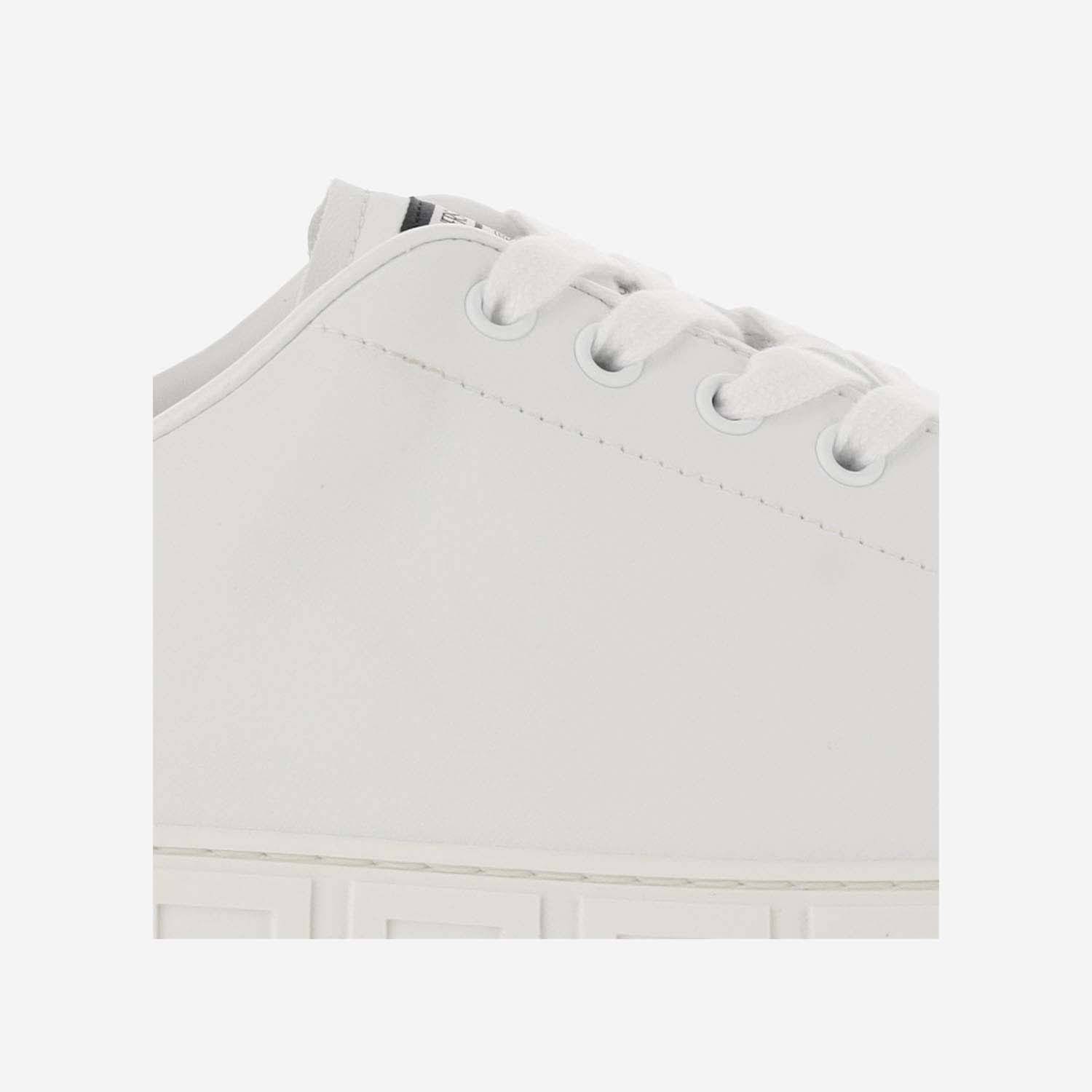 Shop Versace Greek Sneakers In White