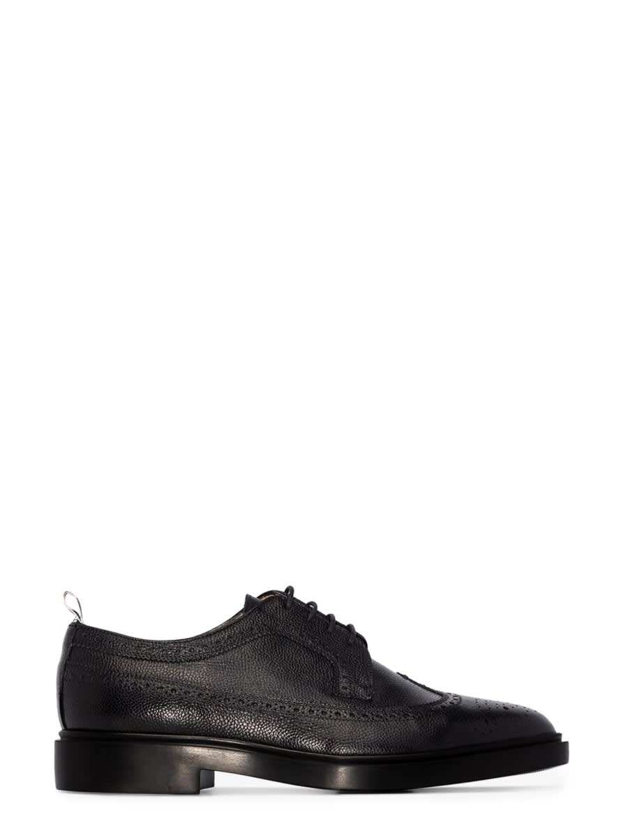 Shop Thom Browne Lace-up Longwing Brogue In Black