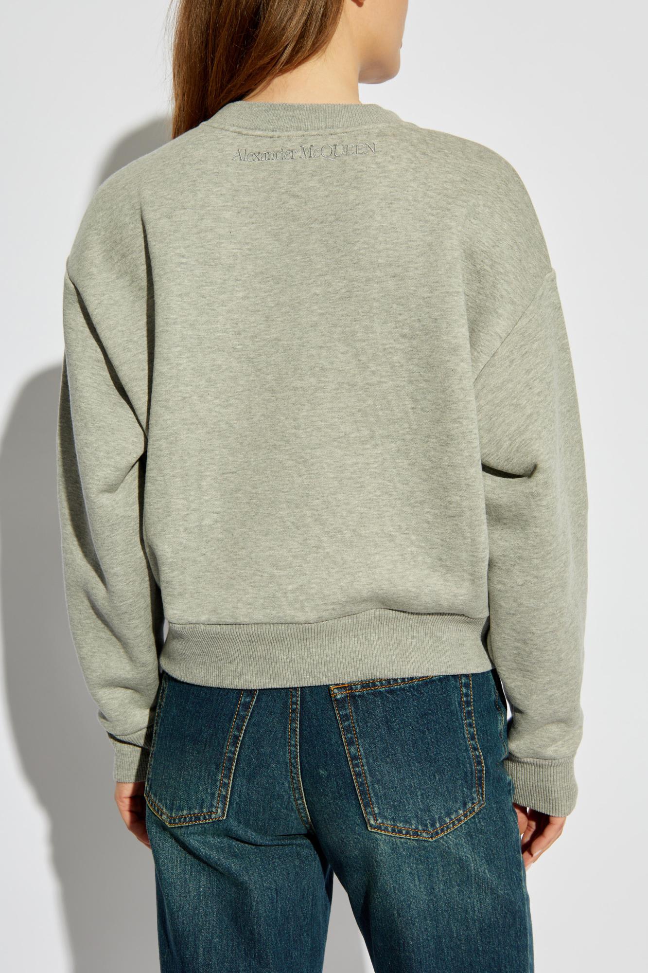 Alexander Mcqueen Cut-out Detailed Crewneck Sweatshirt In Grey Melange