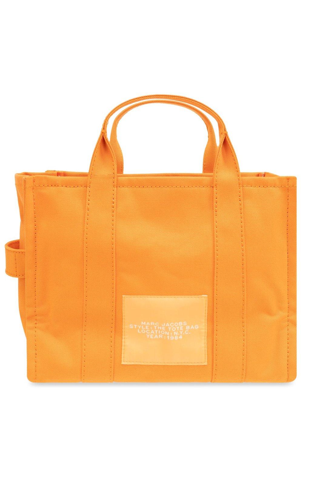 Shop Marc Jacobs Logo Printed Zipped Medium Tote Bag In Tangerine