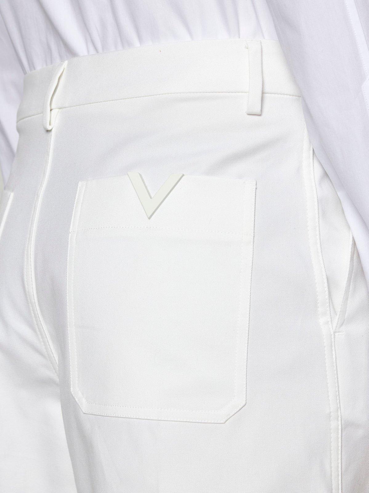 Shop Valentino Logo Plaque Bermuda Shorts In White