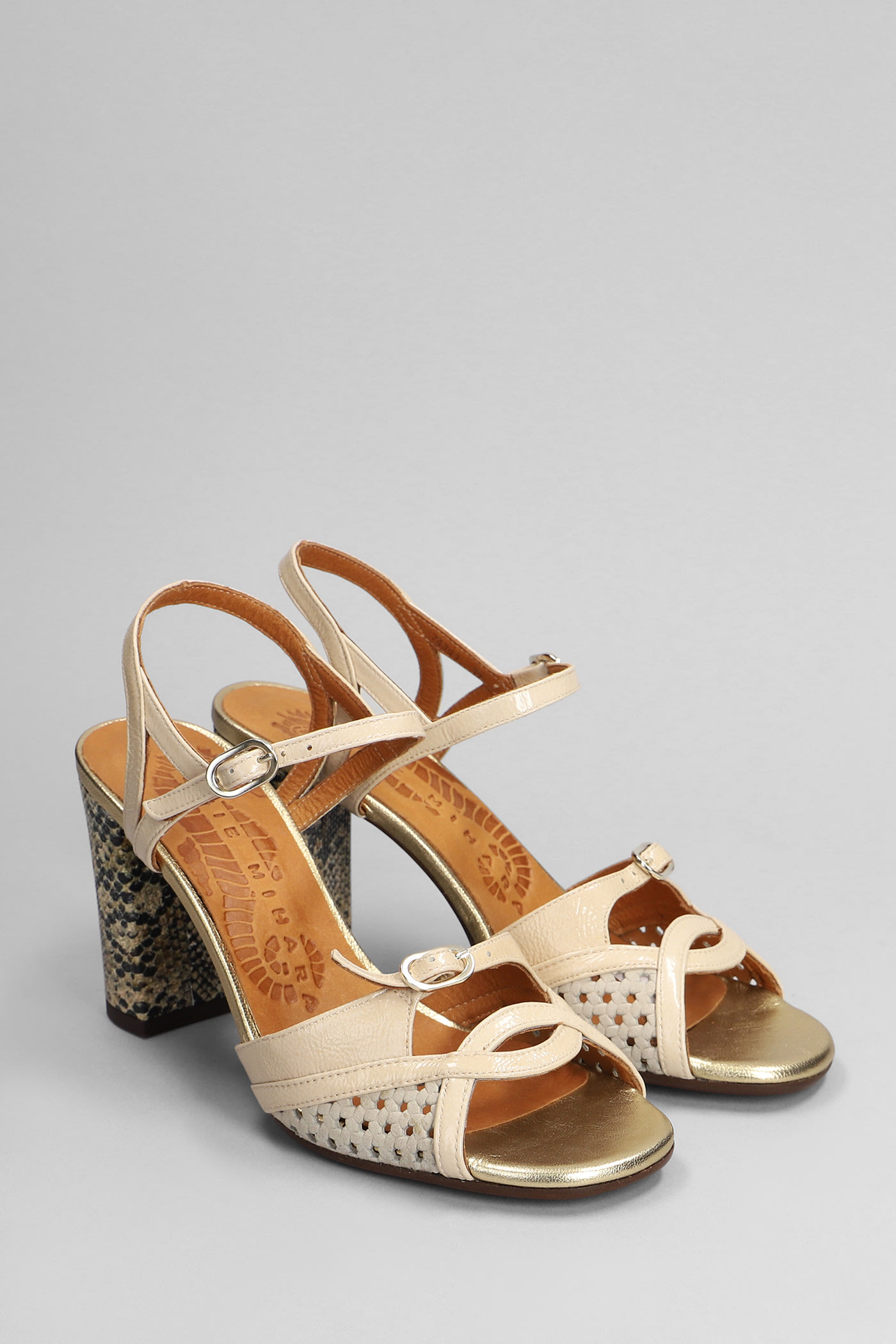 Shop Chie Mihara Bindi Sandals In Beige Leather