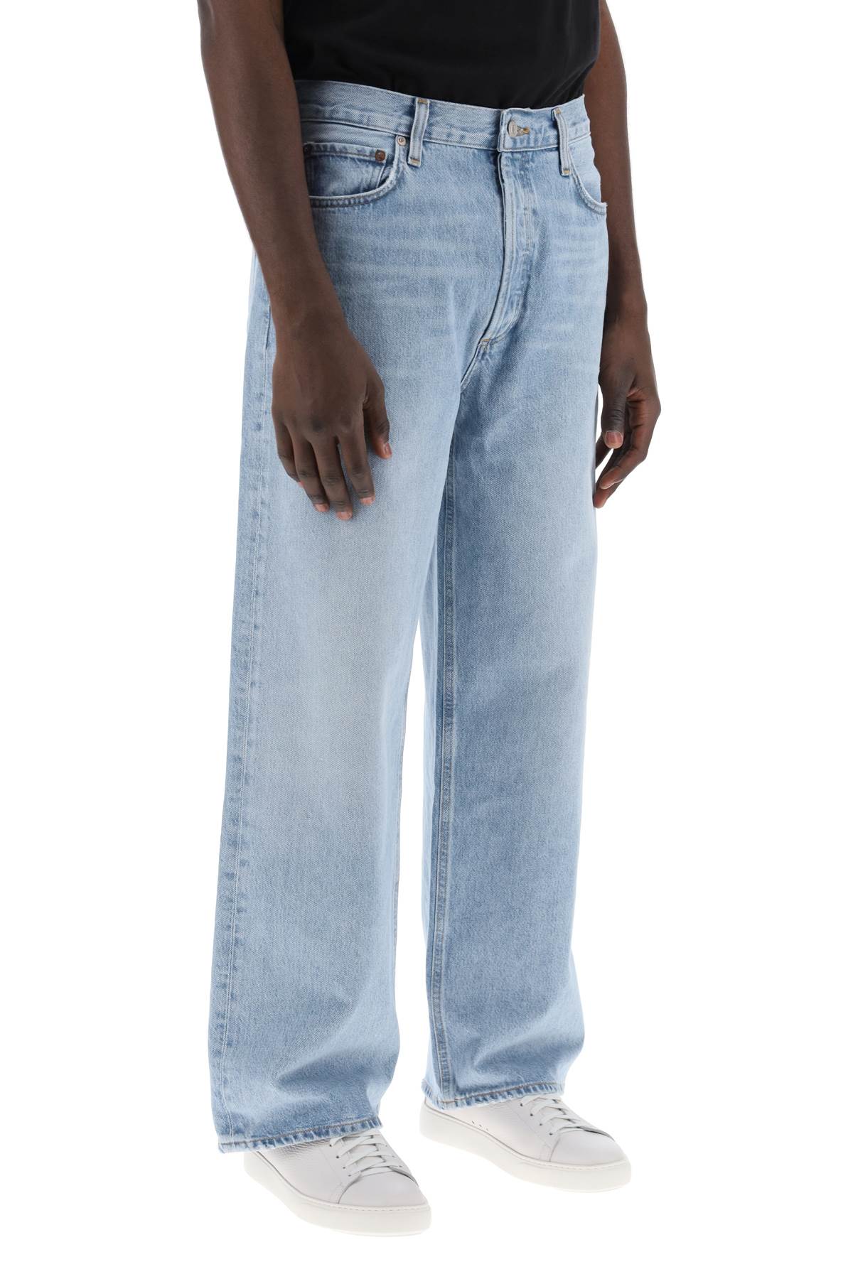 Shop Agolde Baggy Slung Jeans In Harmony (blue)