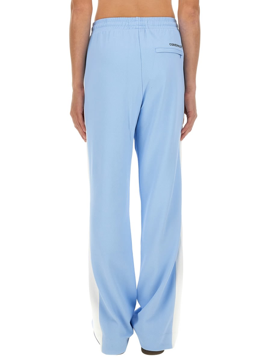 Shop Casablanca Pants With Logo Band In Pale Blue