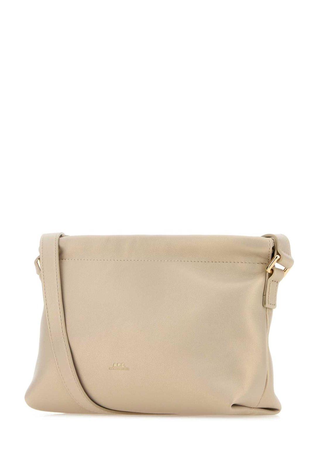 Apc A.p.c. Ninon Logo Embossed Mini Shoulder Bag In Pearl