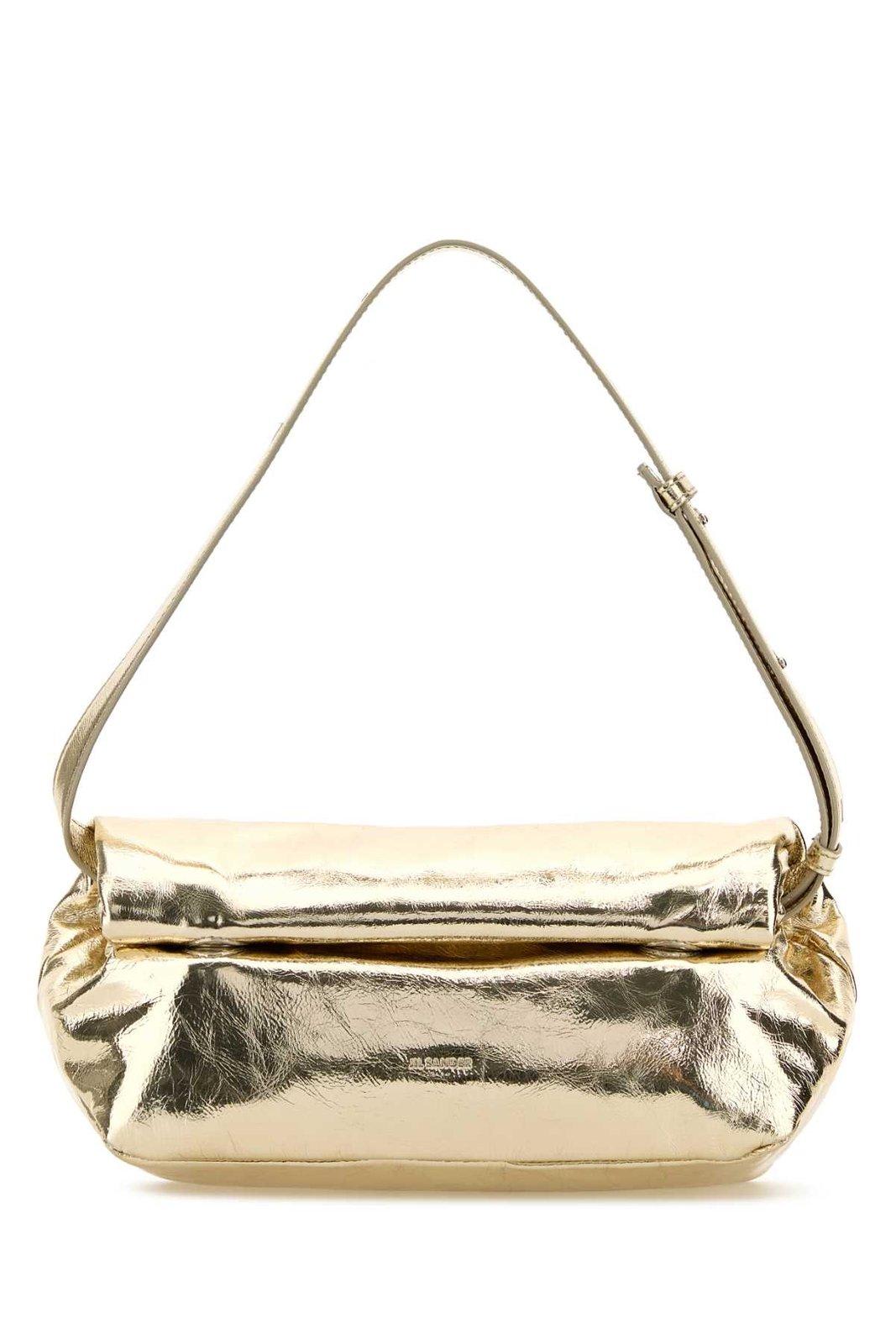 Shop Jil Sander Rollup Small Crossbody Bag In Oro