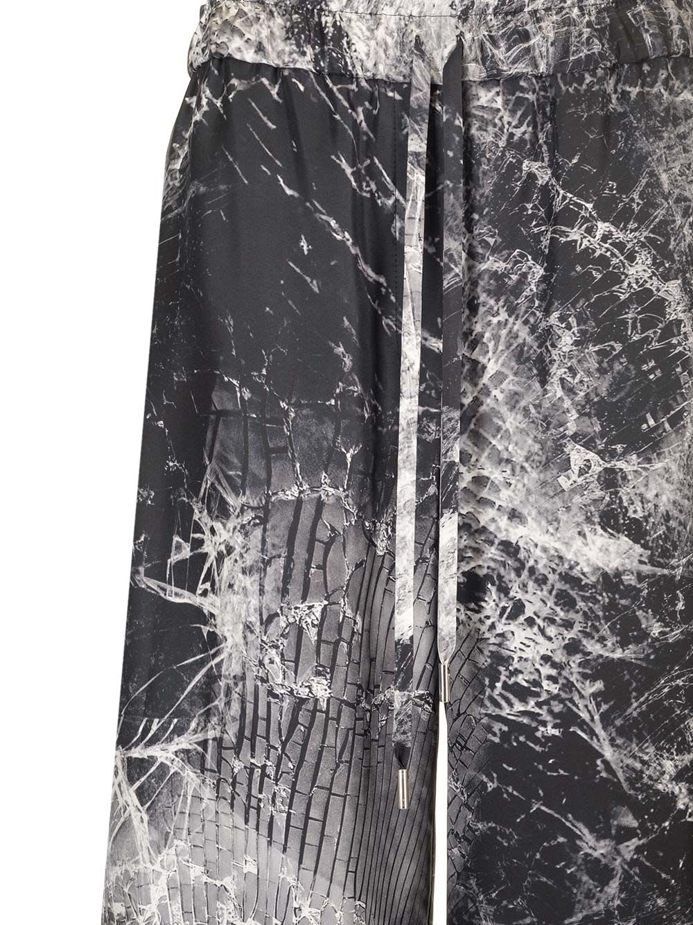 Shop Alexander Mcqueen Smashed Screen Print Trousers In Black