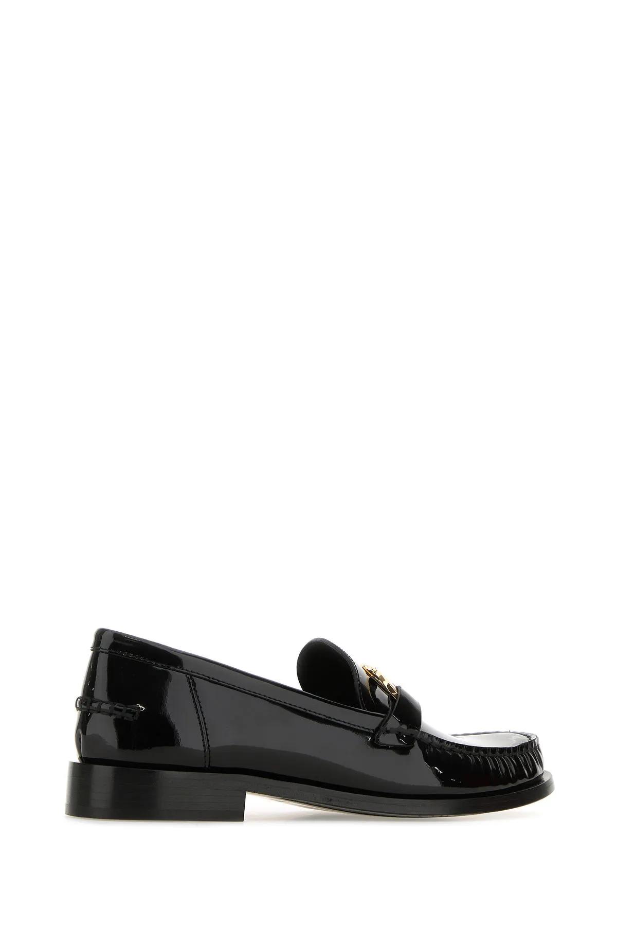 Shop Ferragamo Black Leather Maryan Loafers In Nero
