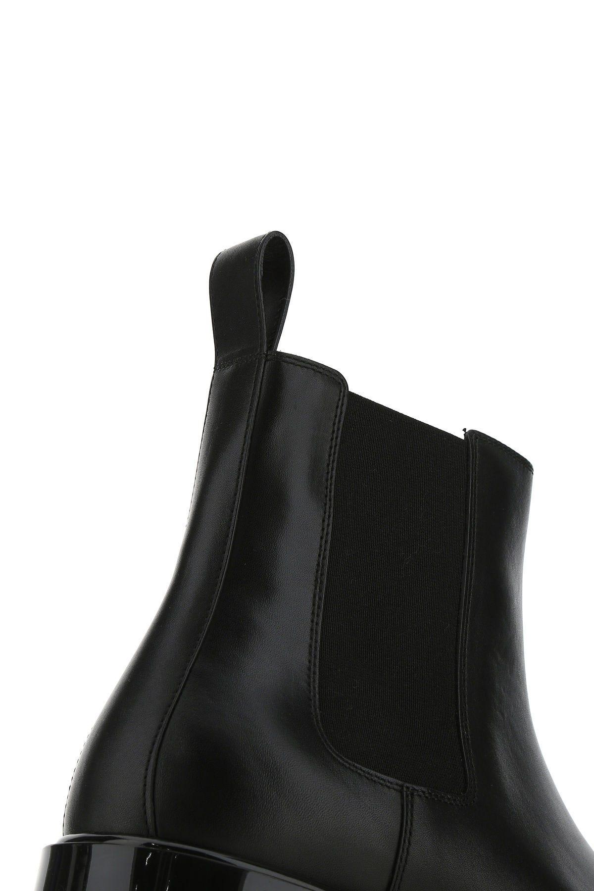 Shop Bottega Veneta Black Leather Strut Boots
