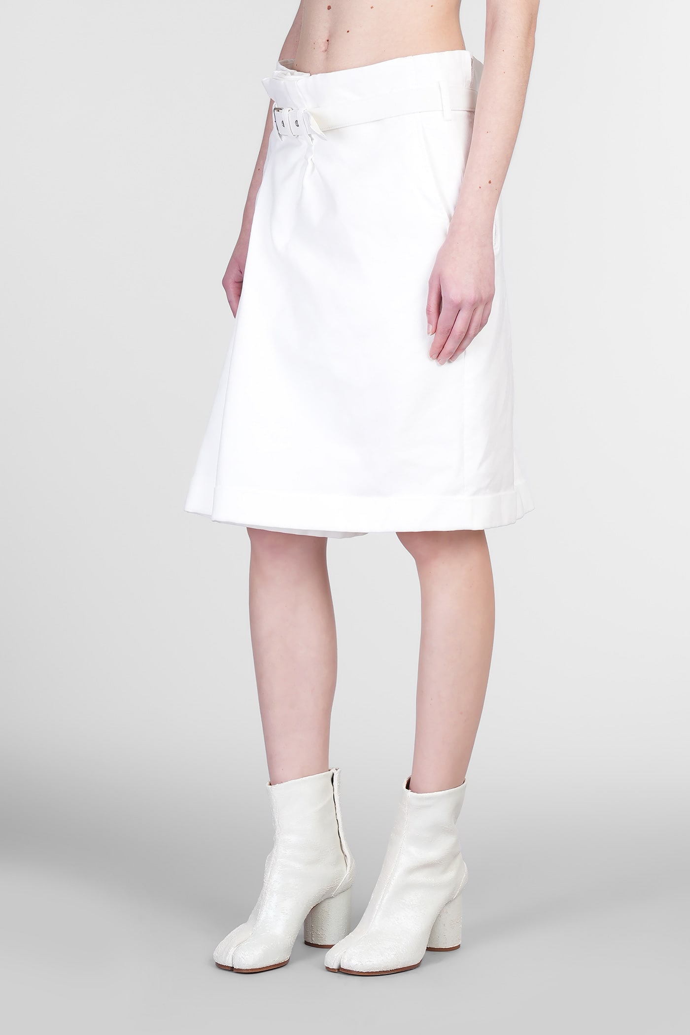 COMME DES GARÇONS SHORTS IN WHITE POLYESTER