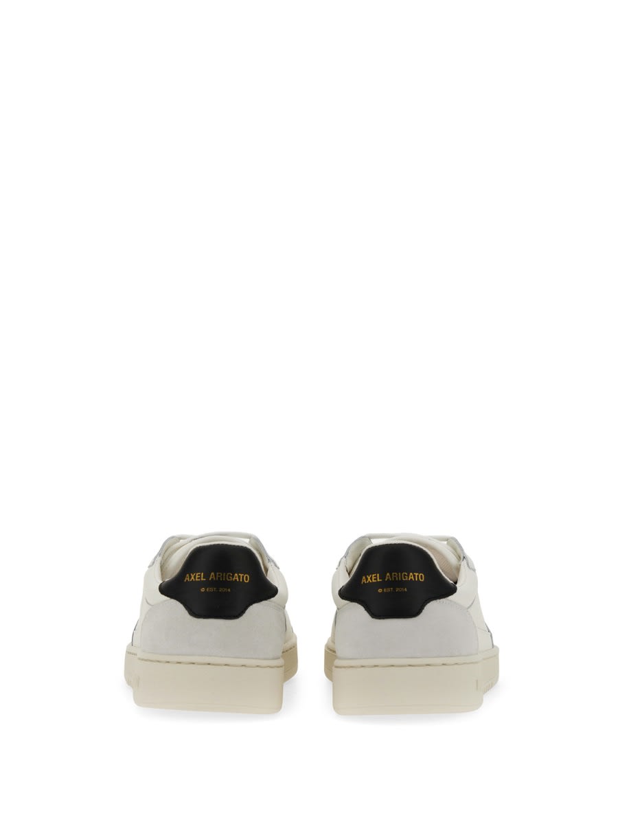 Shop Axel Arigato Sneaker With Logo In White