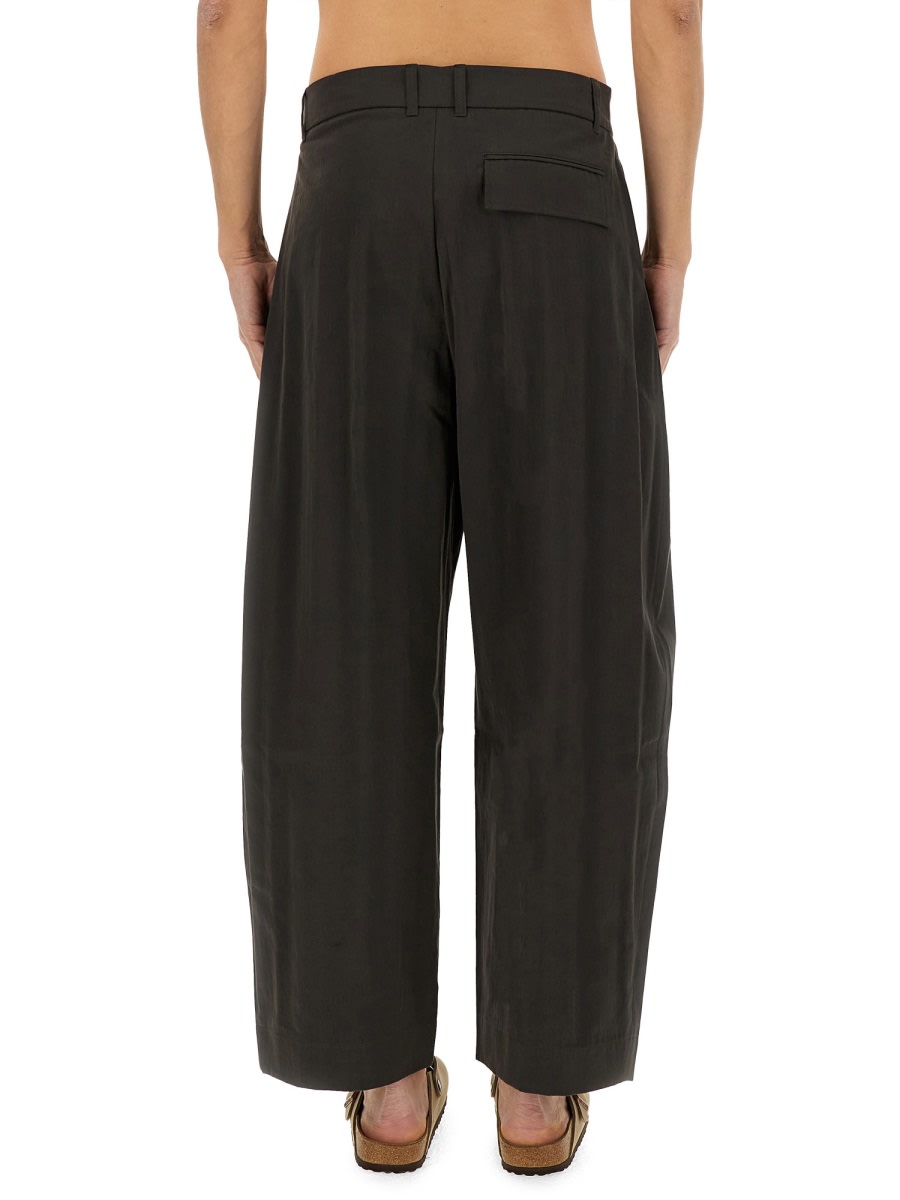 Studio Nicholson Wide-leg Curved Pants With Pleated Front In Brown