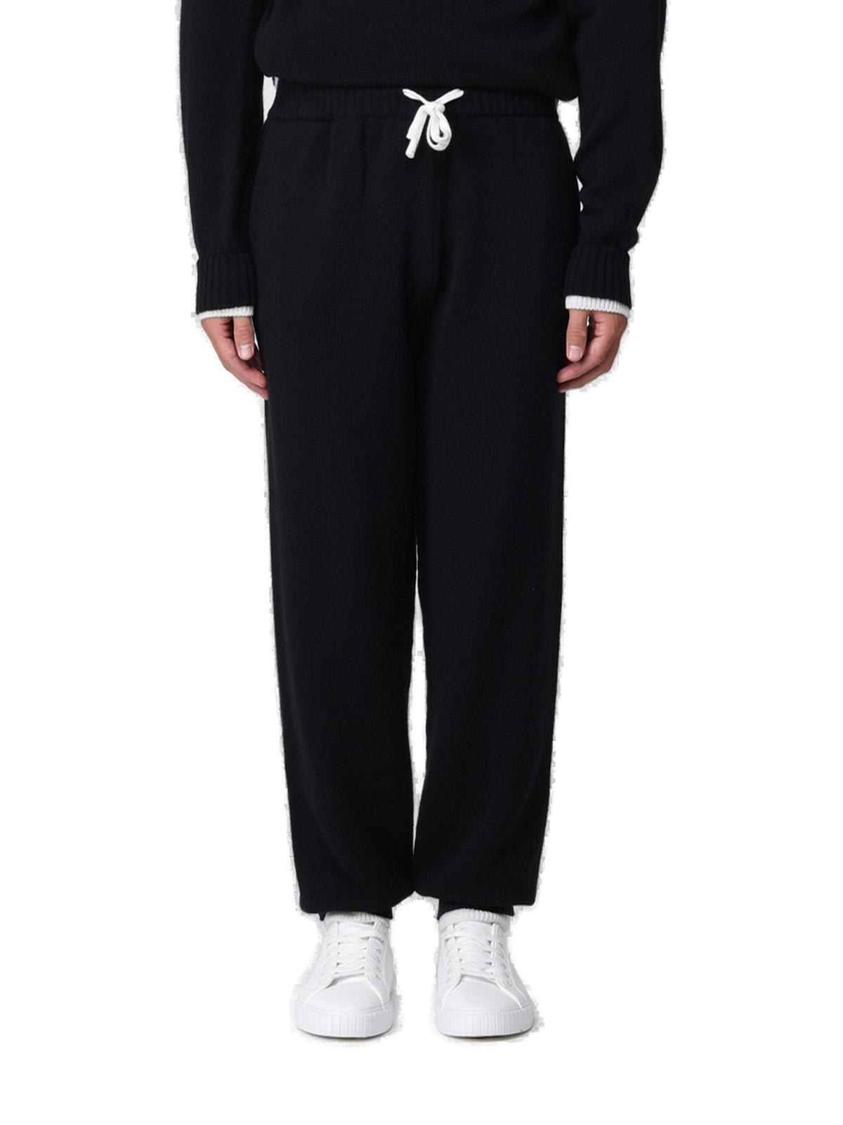 Msgm Tapered Drawstring Knitted Track Pants In Nero