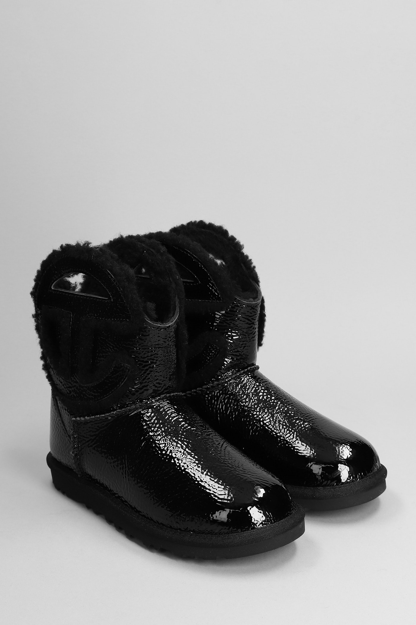 Shop Ugg Logo Mini Crinkle Low Heels Ankle Boots In Black Leather