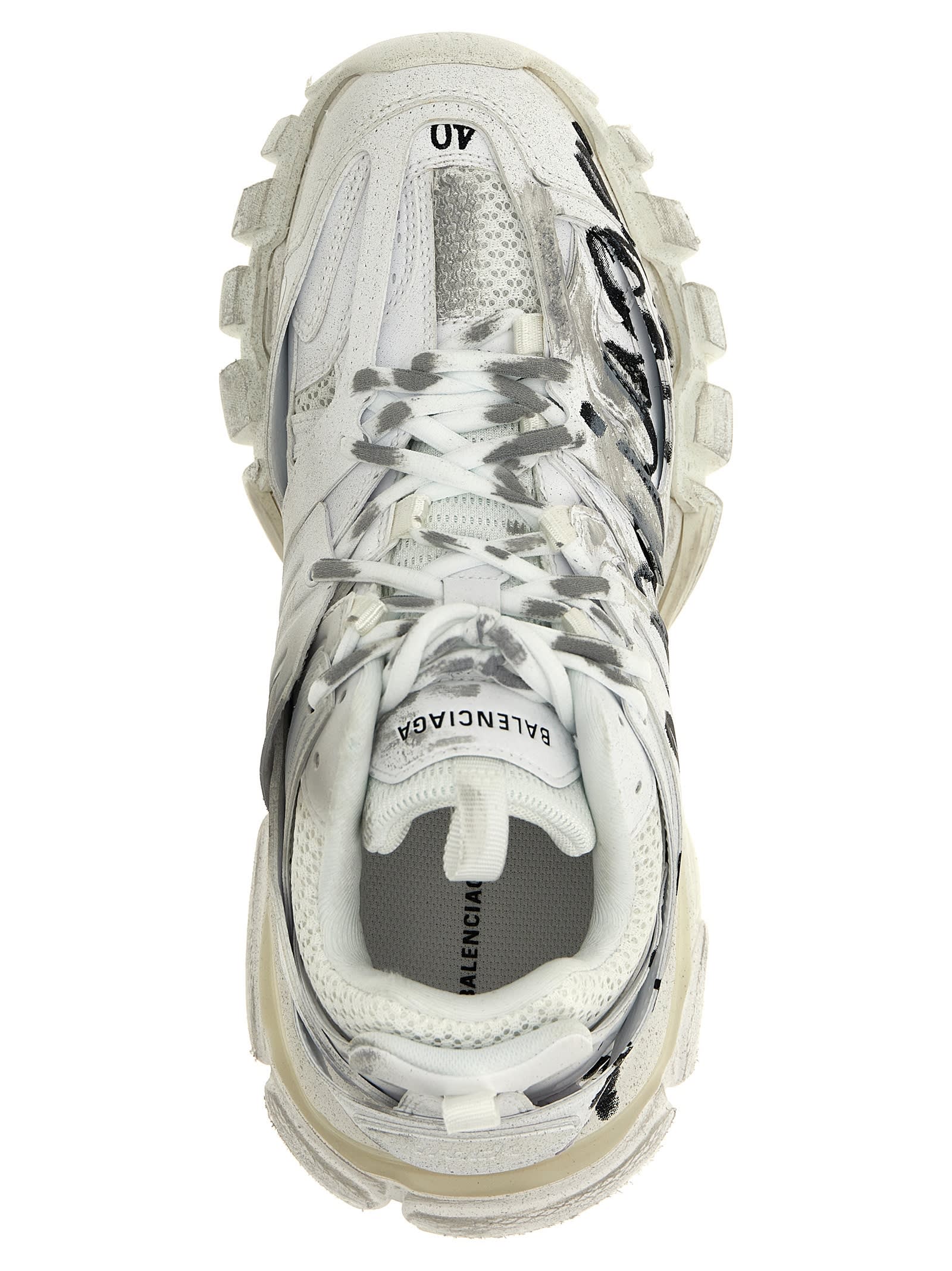 Shop Balenciaga Track Sneakers In White/black