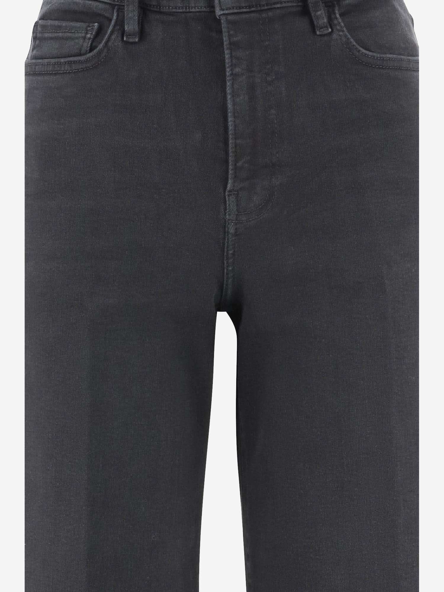 Shop Frame Le Palazzo Crop Jeans In Stretch Denim In Black