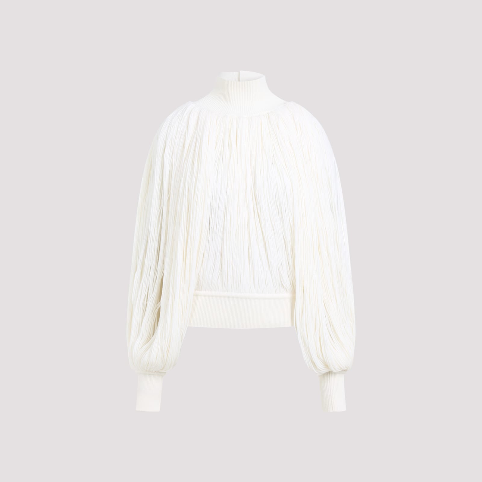 Alaïa Fringed Yarn Knit Merino Wool Top In Blanc Casse