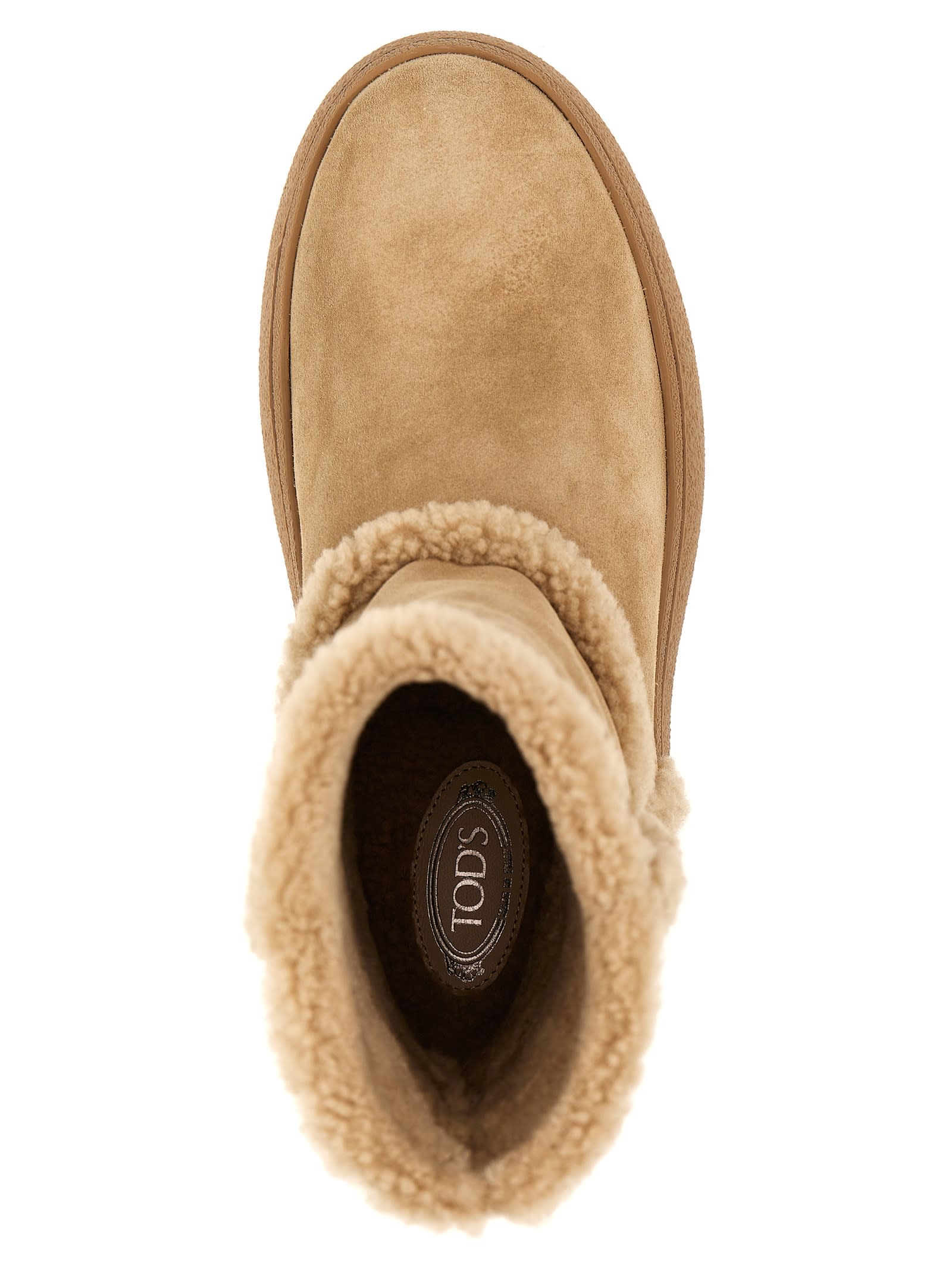 Shop Tod's Winter Gommini Boots In A Beige