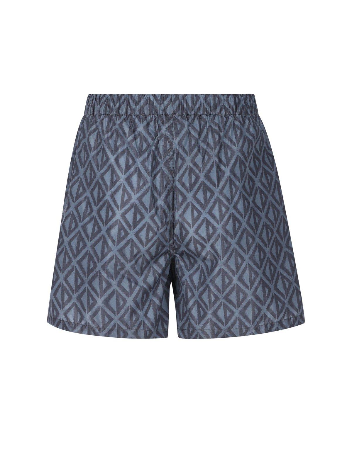 Shop Dior All-over Printed Mid-rise Swim Shorts
