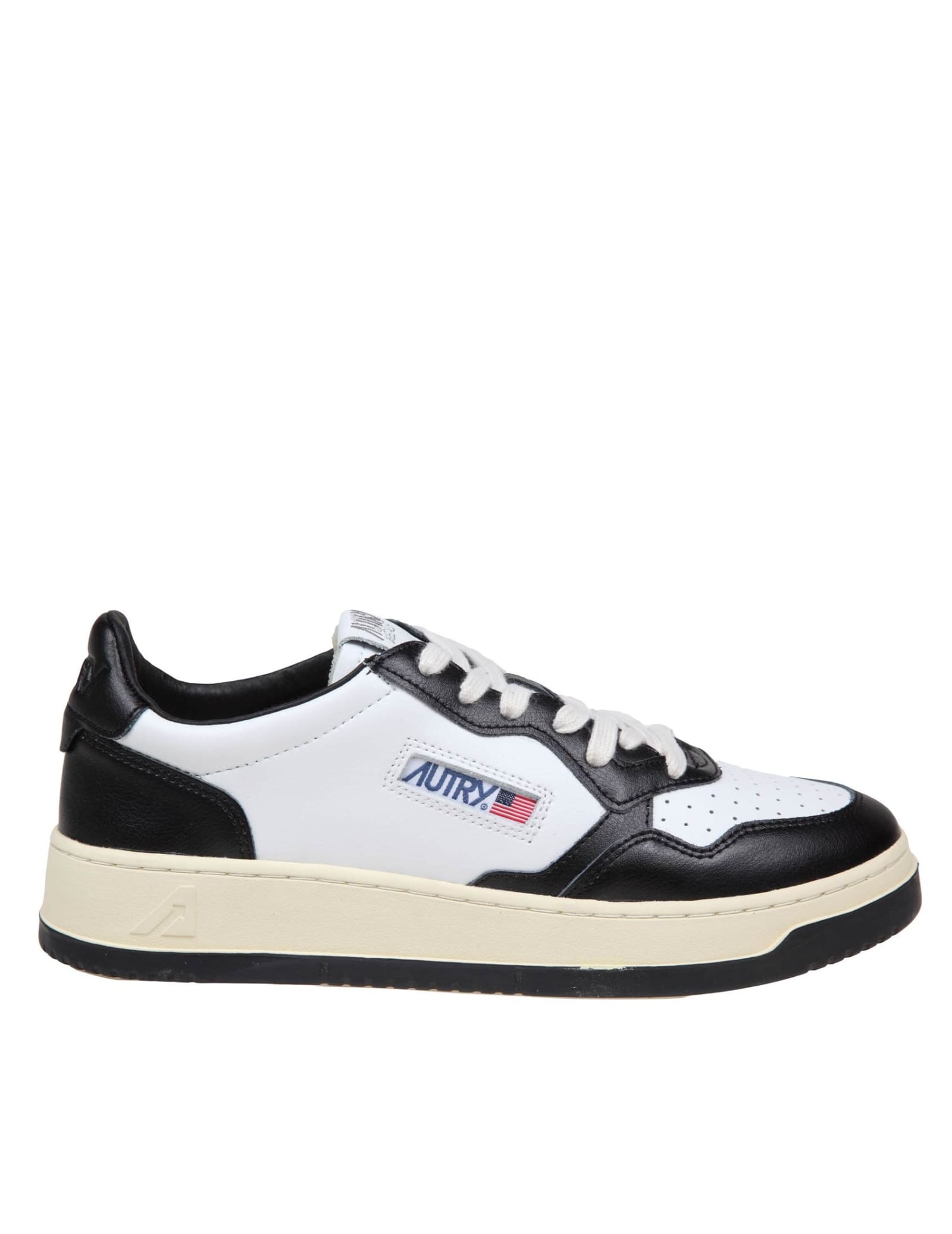 Shop Autry Sneakers In Black And White Leather In White/black