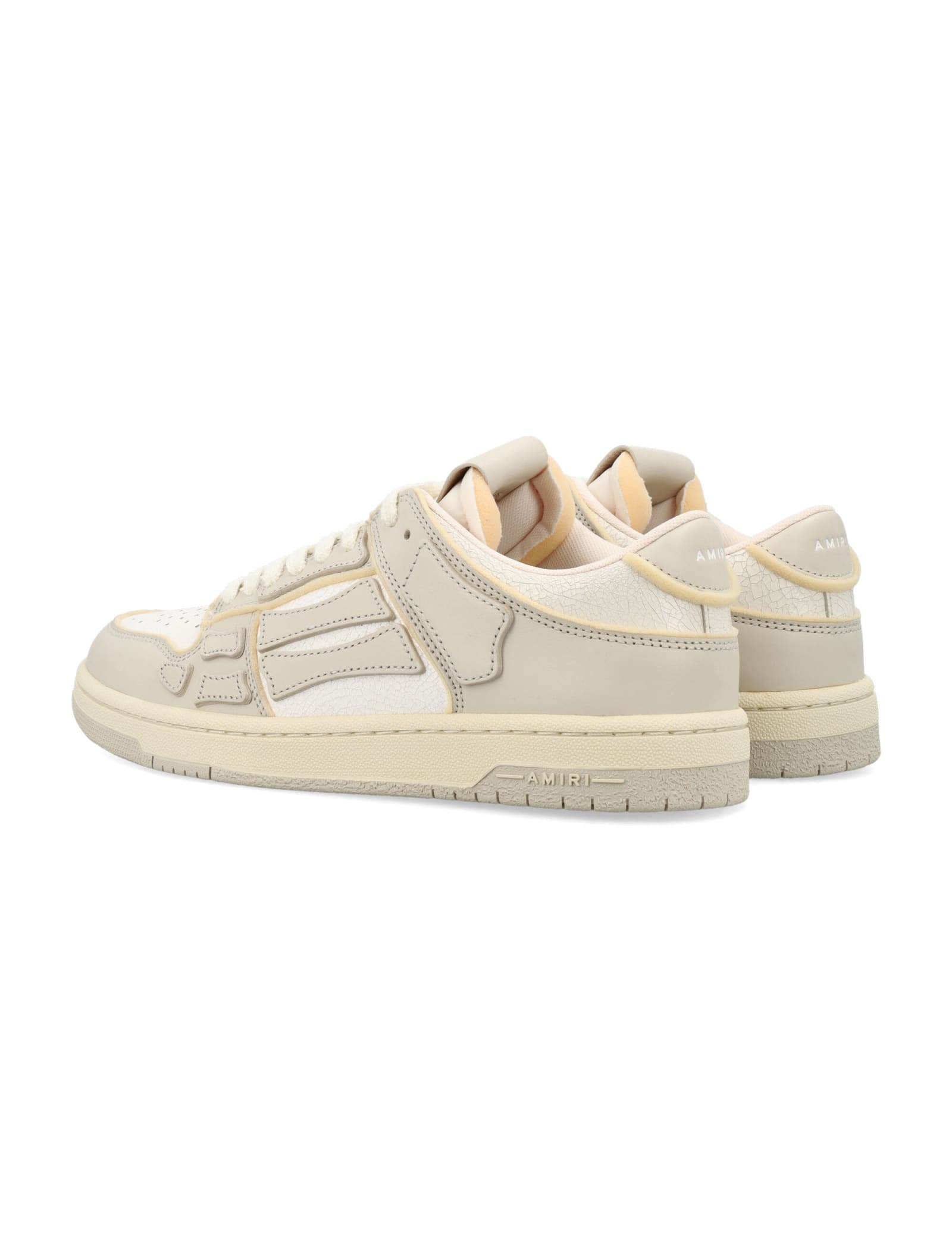 Shop Amiri Collegiate Skel Top Low Sneakers In Birch White