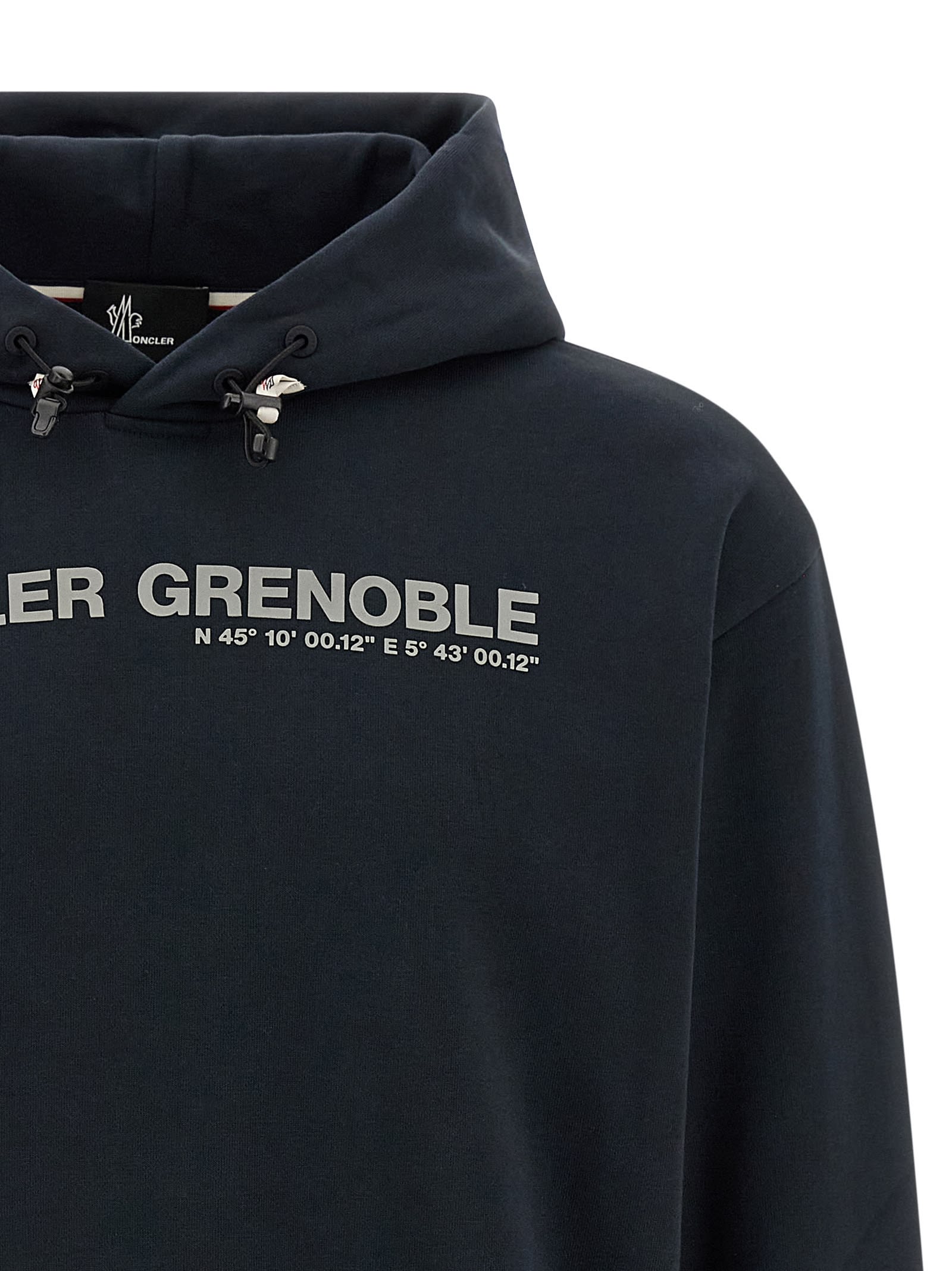 Moncler Grenoble Logo Embroidered Long-sleeved Hoodie In Blue