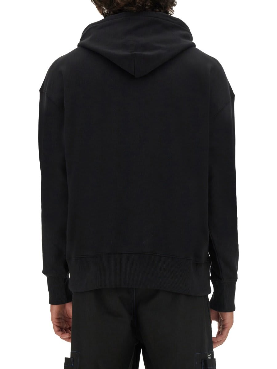 Shop Msgm Logo Printed Drawstring Hoodie In Black